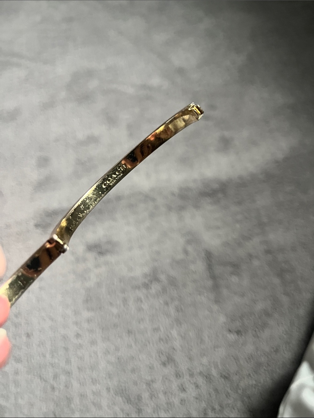 Coach Gold-Tone Signature Crystal Cutout Bangle Bracelet - Picture 4 of 4